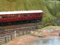 IMG 3483  The steam railmotor has moved off as viewed across the creek.  (Modellers licence: there is no creek at Bodmin General!)