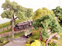 S&D 40 A Film   BR class 4, 4-6-0 No. 75073 emerging from the cutting behind Lyncombe Farm and about to cross Watery Bottom Viaduct before entering Devonshire Tunnel for the coast down the 1 in 50 bank into Bath with the 12.20 pm (SO) Bournemouth to Nottingham.