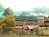 S&D 68  Ex GWR Collett 0-6-0 No.3218 drifts through Lyncombe Vale Station with an up coal train for the coal merchants of the Bath & Twerton Co-Op society, while Ex-LMS Class 4F 0-6-0 No.44422 waits in the bay platform for a clear road with a local suburban to Bath, also on the shed road is Ex-GWR Collett 0-6-0 No.2277 waiting for it’s next turn of duty.