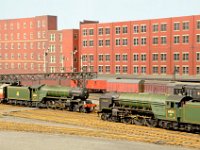 AH6  Thompson pacifics meet at the northern end of London Road. A2/2 60505" Thane of Fife" heads a Kings Cross-Newcastle working as A2/3 60511" Airborne" brings a southbound parcels train through the station. Both of these superb models were built from DJH kits.