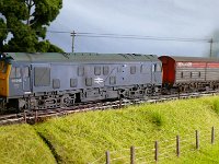 Eyarth240 ps cropped 30%  25 245 approaches Eyarth from Nant Clwyd, hauling a train of Railfreight vans.